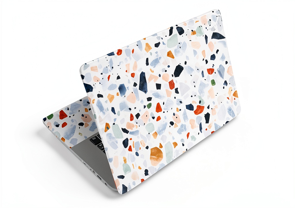 Installing SUPERDANT Laptop Skin Stickers Terrazzo Design on a wooden desk